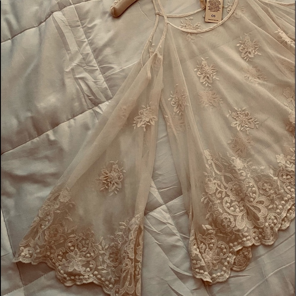 Boutique style cold shoulder sheer blouse